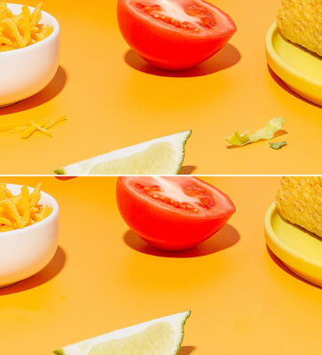 A clump of shredded cheese on the counter is painted out with the Spot Healing Brush in a before image, and is removed in an after image.